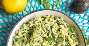 healthy pasta recipe with asparagus and peas in creamy avocado sauce