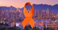 Orange Ribbon overlaid on Vancouver Skyline for Truth & Reconciliation Events Vancouver